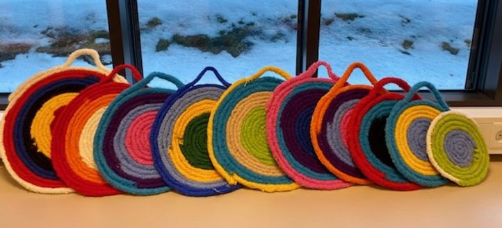 Sitteunderlag av fingerhekling